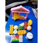 SMALL KITHCHEN SET WITH A HOUSE LIKE STRUCTURE